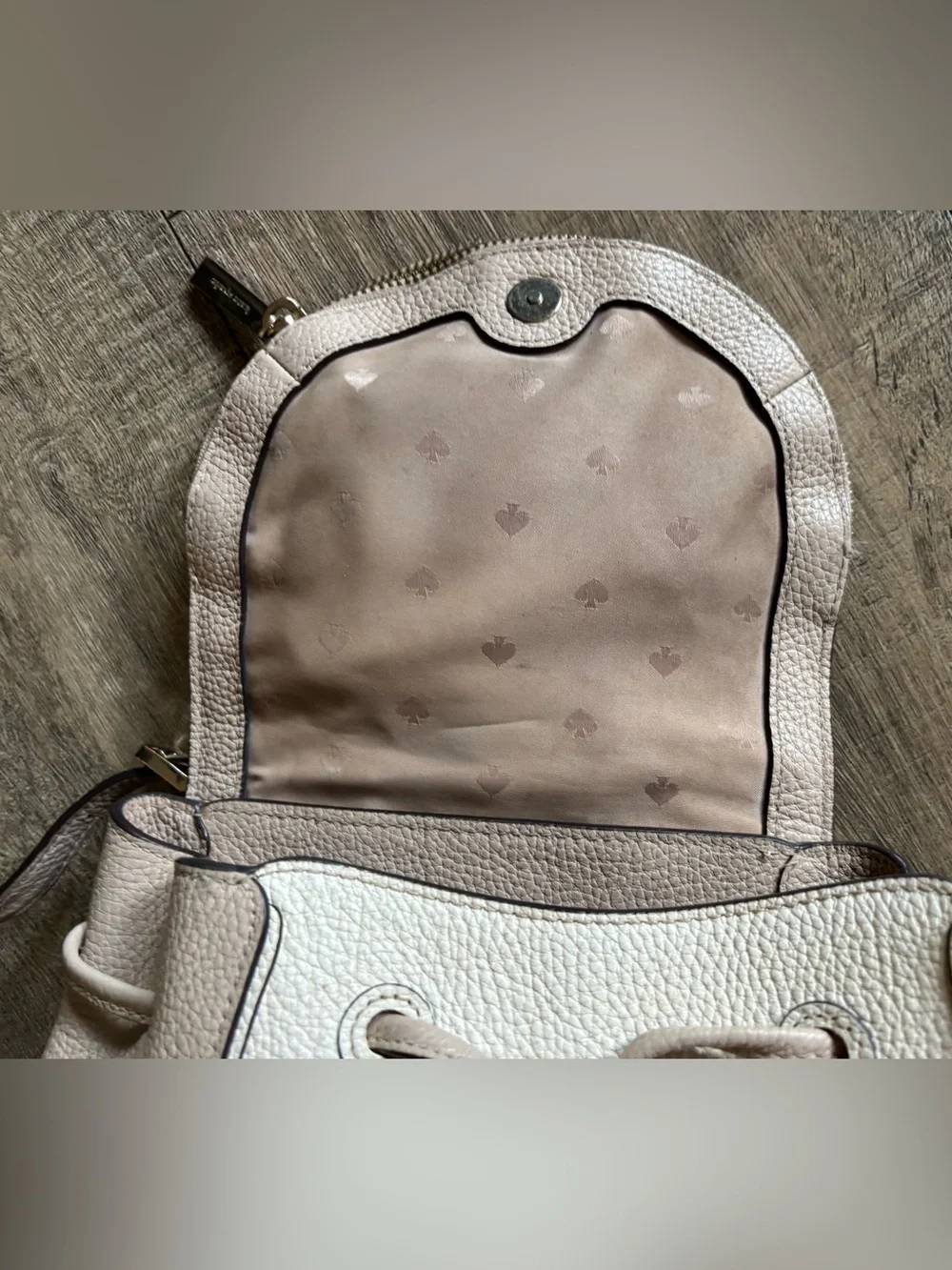 Kate Spade women’s Leila Medium Flap Backpack beige cream pebbled leather purse